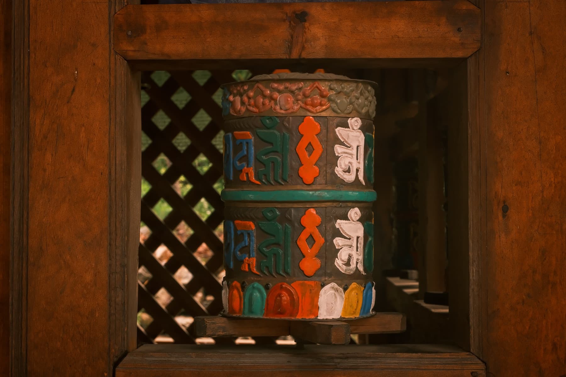Prayer wheel, carved and painted by hand
